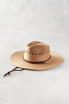 With a wide brim and comfortable chin strap, this hand-woven sun hat provides UPF 50+ protection for mountain hikes, sunny beach days and afternoons in the garden. Plastic Beach, Gardening Hat, Farm Clothes, Anthropologie Wedding, Fantasy Wardrobe, The Gardener, Sunny Beach, Woman Weaving, Mountain Hiking