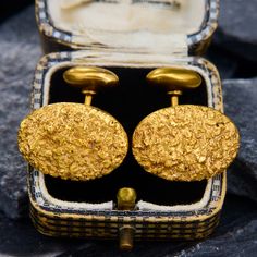 This vintage set of cufflinks features an oval face with gold nugget motifs. The cufflinks are crafted from softly patinated 14k yellow gold and are finished with whale-backs. Classic Gold Oval Cufflinks, Oval Gold Jewelry For Business, Oval Yellow Gold Cufflinks For Gift, Oval Gold Cufflinks For Gift, Antique Gold Cufflinks For Collectors, Antique Gold Cufflinks, Oval Face, Gold Nugget, Oval Faces