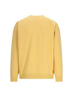 Ever wanted to feel like you're wrapped in a burst of sunshine? This laid-back cotton sweatshirt is just the ticket. It's comfortable, stylish, and perfect for those days when you need a little extra warmth and a splash of color. Long-sleeved crewneck design Cheerful yellow with Saint Laurent embroidery Ribbed neck, cuffs, and hem for added comfort Made in France from 100% cotton Wide fit for a relaxed style Saint Laurent Sweatshirt, Orange Color Combinations, Crewneck Design, Yellow Sweatshirt, Iconic Fashion, Sweatshirt For Men, Leather Cap, Mens Fall, Mens Gloves