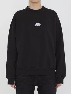 This black cotton jersey sweatshirt features a long-sleeved crewneck design, complete with both the Balenciaga Activewear logo on the front and back. It also has a ribbed collar, cuffs, and hem for a comfortable, regular fit. Size nationality: US Product number: 3304911 Product code: 697869TQVT81083 Composition: 100% cotton Oversized Hoodie With Logo And Crew Neck, Black Logo Sweater For Streetwear, Black Sweater With Logo For Streetwear, Black Long Sleeve Sweater With Logo Detail, Black Long Sleeve Sweater With Logo, Long Sleeve Sweater With Logo For Streetwear, Black Crew Sweater With Logo Print, Black Crew Sweater With Ribbed Neckline, Crew Neck Sweater With Logo For Streetwear