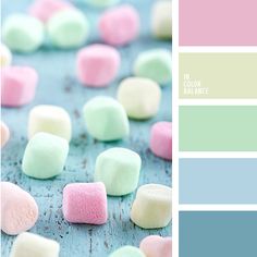 some marshmallows are sitting on top of each other in color swatches