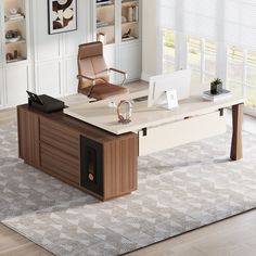 an office desk with a chair and computer on it in the middle of a room