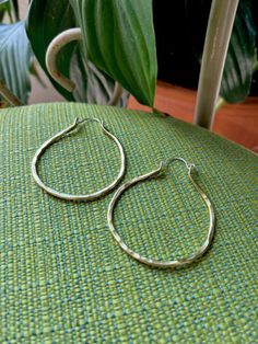 These big mommas are 2.5 inches. They are hand formed from brass wire with a sterling silver hook that goes through your ear. These beauties are my take on a classic hoop that you will wear for years to come!! Everyday Silver Hoop Earrings With French Hook, Hoop Earrings With French Hook For Gift, Small Hoop Jewelry For Everyday Use, Everyday Handmade Metal Hoop Earrings, Hypoallergenic Silver Hoop Earrings In Brass, Hypoallergenic Brass Hoop Earrings, Oval Nickel-free Hoop Earrings For Everyday Wear, Sterling Silver Hoop Earrings With French Hook, Nickel-free Oval Hoop Earrings For Everyday