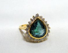 Emerald Ring, vintage18 K solid gold hallmarked, Natural emerald Diamond gemstone ring. Beautiful collection piece in very good condition. USA ring size -7.5 ( we can adjust size), size of top-16.5/15.5 mm, emerald weight-4 carat, diamond weight-0.63 carat VS G. Formal Teardrop Emerald Ring, Gold Emerald Pear-shaped Ring, Gold Pear-shaped Emerald Ring, Teardrop Emerald Ring For Formal Occasions, Gold Teardrop Emerald Ring, Gold Emerald Pear-shaped Ring For Anniversary, Pear-shaped Gold Emerald Ring, Emerald Ring Vintage Antique, Diamond Emerald Ring