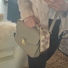 The Lv Pochette Mtis Handbag . Good Condition Don’t Miss Out! Cosmetic Flaws I E Scratches Discoloration On Hardware And Stains On Interior , Rubbing/Wear On Corners Detailed Features Retails:2570 Less Tax/ Out Of Stock Item Comes With Lv Dust Bag Comes With Authentic Lv Bandeau Retails $210 9.8 X 7.5 X 2.8 Inches (Length X Height X Width) Tourterelle Grey Monogram Empreinte Embossed Supple Grained Cowhide Leather And Supple Grained Cowhide Leather Supple Grained Cowhide-Leather Trim Textile Lining Gold-Color Hardware S-Lock Closure Outside Zipped Pocket 3 Inside Compartments Strap:Removable, Adjustable Strap Drop: 18.9 Inches Strap Drop Max: 21.7 Inches Handle:Single The Reference I Daily Use Flap Bags With Dust Bag Included, Daily Use Monogram Canvas Flap Bag With Removable Pouch, High-end Beige Flap Bag For Travel, Monogram Canvas Flap Bag For Daily Use, Daily Use Monogram Canvas Flap Bag, Monogram Canvas Flap Bag With Removable Pouch, Everyday Flap Bag With Detachable Strap In Monogram Canvas, Monogram Canvas Flap Satchel For Everyday Use, Everyday Monogram Canvas Flap Bag With Detachable Strap