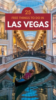 a gondola floating on the water in front of a building with a red sign that says 25 free things to do in las vegas