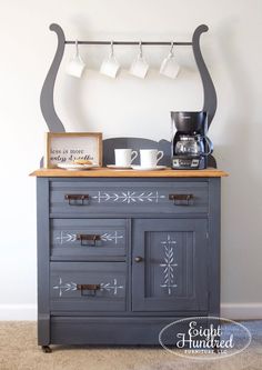 an old dresser has been painted with chalk paint and stencils to give it a new look