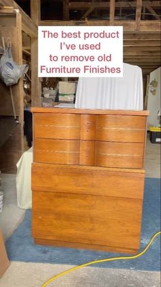 a wooden dresser with a sign on it that says the best product i've used to remove old furniture finishes