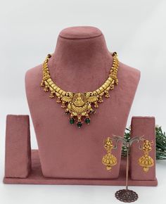 Experience the divine elegance with our 18-Inch Laxmi Temple Necklace, meticulously crafted to capture the spiritual essence and opulence of a temple. This necklace pays homage to Goddess Laxmi and the cultural significance she represents. It's not only a piece of jewelry but a symbol of devotion and spirituality. Materials: Temple Design: The necklace features intricate temple-inspired design elements, showcasing the rich heritage of Indian craftsmanship and devotion. Design: The necklace boast Elegant Necklaces For Diwali Rituals, Elegant Gold Necklace For Navratri, Elegant Necklace For Diwali Rituals, Elegant Temple Necklace For Festivals, Spiritual Temple Necklace For Celebrations, Temple Jewelry Necklace As Gift, Elegant Dual-tone Necklaces For Navratri, Elegant Dual-tone Necklace For Navratri, Temple Necklace As Gift With Elegant Design