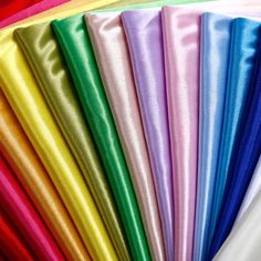 many different colors of satin fabric