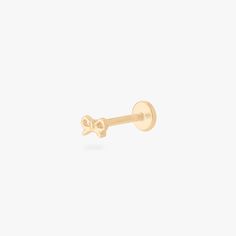 micro bow flatback stud in gold color:null|gold Flat Backed Earrings, Flatback Earrings, Yellow Gold Screw Back Piercings For Gifts, Tiny Flat Back Earrings, Dainty Yellow Gold Earrings With Screw Back, Flat Piercing, Piercing Aftercare, Bow Flats, Flat Back Earrings