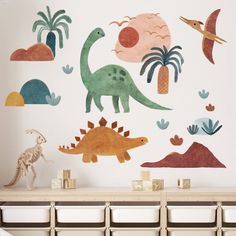 the dinosaur wall decals are painted in different colors