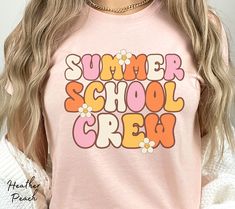 "Summer school teachers, show your enthusiasm for summer school with this cute retro aesthetic \"Summer School Crew\" shirt. Our crewneck t-shirt features daisies and retro lettering in pink, orange, cream, and yellow colors. These make great matching teacher shirts and are sure to be a hit with your fellow teachers and students. See more of our Teacher Shirts at: https://www.etsy.com/shop/DesiLuAndCo?ref=seller-platform-mcnav§ion_id=40932518 Visit our shop for more great items at: https://www.etsy.com/shop/DesiLuAndCo?ref=seller-platform-mcnav Welcome to our shop! Your satisfaction is our main goal and we are glad to answer any questions you might have about our products. Please contact us if you have any questions or customization queries. If you like the design but prefer a different sh Spring School Tops With Funny Print, Funny Print Tops For School In Spring, Casual Summer Tops For Teacher Appreciation, Summer Slogan Tops For School, Summer School Tops With Slogan, Summer School Tops With Graphic Print, Summer School Slogan Tops, Cute Tops For College In Spring, Retro Relaxed Fit Tops For School