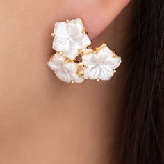 Lightweight Material: gold plated brass Drop: 0.75" For pierced ears IMPORTED Gold Flower Cluster Earrings For Pierced Ears, Gold Plated Flower Earrings For Pierced Ears, Pierced Flower-shaped Gold Plated Jewelry, White Gold Plated Flower Earrings, White Gold-plated Flower Earrings, Gold Clip-on Flower Shaped Jewelry, Gold Plated Single Earring With Flower Shape, Gold Plated Single Earring In Flower Shape, White Gold Plated Clip-on Earrings