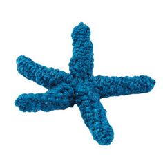 a blue crocheted starfish is shown against a white background, it looks like an ocean creature