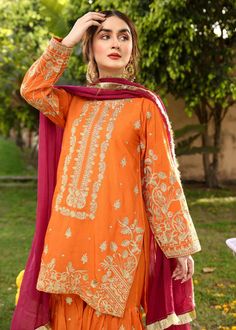 Description Shirt : Orange raw-silk shirt with Embroidery. Trouser : Orange raw-silk Gharara with Embroidery. Dupatta : Reddish maroon chiffon dupatta. Long Sleeve Sharara With Dabka For Navratri, Unstitched Embroidered Sharara, Silk Sharara With Long Sleeves For Diwali, Long Sleeve Sharara With Dabka For Festivals, Long Sleeve Dabka Sharara For Festive Occasions, Orange Chinon Sharara For Eid, Festive Long Sleeve Dabka Sharara, Designer Naqshi Sharara For Navratri, Festival Sharara With Naqshi In Jamawar