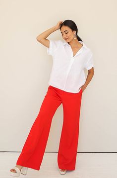 Product details: Wide legged pant Detailed waistline Zipper and button closure V-detailing on back waistline Functioning pockets Comfortable, baggy fit Stretch fit with spandex High quality Model is 5'6" wearing a size S Size Chart: Size Waist Length Inseam Front Rise S 26" 43.5" 32" 12" M 27" 44" 32" 12.5" L 30" 44" 32" 12.5" Outfit Details: Boardroom White Satin Blouse Boston White Linen Blouse Big City Cream/Red Tweed Blazer Self + Care Instructions: Self: 97% Polyester, 3% Spandex Lining: 10 Red Straight Leg Bottoms With Button Closure, Red Wide-leg Workwear Pants, Red Workwear Pants With Button Closure, Red Bottoms With Pockets And Loosely Fitted Hips, Red Wide-leg Pants With Pockets, Red Wide-leg Relaxed Fit Pants, Red High-waisted Pants With Pockets, Relaxed Fit Red Wide Leg Pants With Elastic Waistband, Casual Red Straight Leg Dress Pants