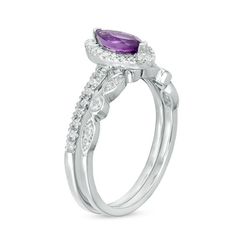 Celebrate your unique love story with this vintage-inspired gemstone bridal set. Crafted in cool 10K white gold, the engagement ring sparkles with an 8.0 x 4.0mm marquise-shaped bright purple amethyst wrapped in a frame of and atop a slender shank lined with glimmering petite lab-created white sapphires. On your wedding day, complete her keepsake look with the coordinating band decorated with alternating created sapphire-adorned marquise shapes and bezel-set created sapphires. Buffed to a brilliant luster, this bridal set symbolizes your vow to honor and cherish her. Peoples Jewellers, Bridal Engagement Rings, Sparkling Rings, Bright Purple, Bridal Set, White Sapphire, Bridal Sets, On Your Wedding Day, Purple Amethyst