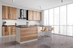 an empty kitchen with wooden cabinets and counter tops in front of a large window overlooking the city