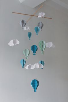 paper hot air balloons hanging from the ceiling