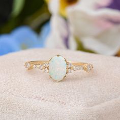 Oval Shape White Opal Gemstone Engagement Ring, Solid Gold Handmade Jewelry, Gift for Her 💎 Gold K: 14K or 18K Solid Gold 💎 Custom Gold Color: Rose Gold, Yellow Gold, White Gold 💎 Round Diamond: 14 Pcs 1.35 MM 💎 Oval Shape White Opal: 1 Pcs 7x5MM 💎 Total Diamond Ctw: 0.13 Ctw Natural 💎 Total White Opal Ctw: 0.60 Ctw Natural 💎 Diamond Color-Clarity: F Color SI Clarity 💎 White Opal Color : White 💎 Setting Type: Prong 💎 Certified Item 💎 Product Code: MR0011629-OP 📎 If you have questions Gold Opal Engagement Ring, White Opal Engagement Ring, Diamond Ring Oval, Small Engagement Rings, Opal Wedding Ring, Vintage Opal Engagement Ring, Opal Diamond Ring, Opal Engagement Ring, Opal Wedding