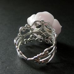 "The palest shade of purple resin has been used to create a resin rose that has then been set upon a filigree adjustable ring base in your choice of finish in this delicate handmade rose ring that is made to be adjustable from size 6 and up. Flower Size: 19mm To see this ring in all available colors, check here: http://etsy.me/1gr9dLc The base for this handmade ring is adjustable, which makes this delicate rose ring comfortable no matter the size of the wearer's fingers (size 6 and up) as well a Adjustable Pink Resin Rings, Nickel-free Pink Rings For Weddings, Elegant Nickel-free Pink Ring, Handmade Elegant Resin Rings, Elegant Handmade Resin Rings, Purple Resin, Resin Rose, Ring Purple, Handmade Rose