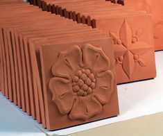 several clay blocks are lined up on a table