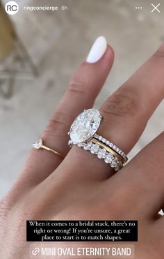 a woman's hand with two wedding rings on it and the words, when it comes to a bridal stack, there's no right or wrong