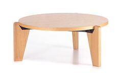 a round wooden table with black legs on a white background