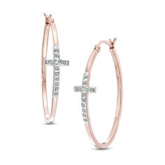 A bit of sparkle, a touch of devotion - enjoy the union of these Diamond Fascination™ earrings. Crafted in sterling silver with warm 18K rose gold plate, each hoop is centered with a cross-shaped adornment that dazzles with one diamond accent and beautiful diamond enamel beading. Polished to a brilliant shine, these earrings secure with hinged backs. Diamond Fascination™ is a patented handmade process which crystallizes diamond dust into enamel to simulate round-cut diamonds. Gold Earrings Zales, Shaped Hoop Earrings, Rose Gold Plate, Earring Hoop, Oval Hoop Earrings, Diamond Dust, Diamond Earring, Diamond Hoop Earrings, Gold Enamel