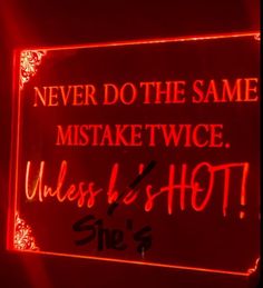 a red neon sign that says, never do the same mistke twice unless hot