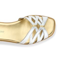 A slide sandal ready for summer, featuring intricate pattern work in gold & silver nappa leather. All sales are final. No returns or exchanges. Formal Calf Leather Sandals With Gold-tone Hardware, Summer Leather Sandals With Gold-tone Hardware, Modern Silver Slip-on Sandals, Silver Slip-on Beach Sandals, Sandals Ideas, Gold T-strap Sandals With Buckle Closure For Summer, Sarah Flint, Slippers For Girls, High Quality Shoes