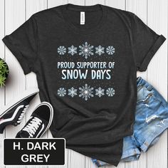 This T-Shirt features a funny design that reads "Proud Supporter Of Snow Days", perfect for Christmas and winter sports enthusiasts. It gives off a cozy and festive vibe, ideal for casual wear during the holidays. Target audience includes those who enjoy a touch of humor in their wardrobe and appreciate the winter season. Product features - Made with 100% Airlume combed and ring-spun cotton - Retail fit for casual and semi-formal settings - Manufactured in a humane, sustainable way by Bella+Canvas - Breathable fabric suitable for layering - Tear-away label for minimal skin irritations Care instructions - Machine wash: cold (max 30C or 90F) - Non-chlorine: bleach as needed - Tumble dry: low heat - Iron, steam or dry: medium heat - Do not dryclean Snow Days, Women Tshirt, Snow Day, Winter Sports, Funny Christmas, Christmas Humor, Christmas Shirts, Funny Design, Breathable Fabric