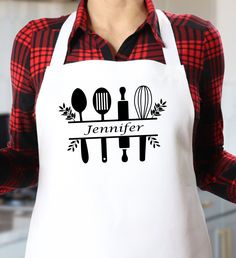 a woman wearing an apron with utensils on it