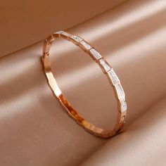 41136156540951 Rose Gold Metal Bangle For Wedding, Rose Gold Stainless Steel Bracelet For Formal Occasions, Formal Rose Gold Stainless Steel Bracelets, Rose Gold Metal Bangle With Bracelet Strap, Minimalist Rose Gold Bracelets For Party, Minimalist Rose Gold Bracelet For Parties, Elegant Rose Gold Metal Bracelet, Elegant Rose Gold Stainless Steel Bracelets, Crystals Design