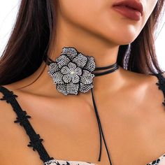 Add a touch of disco glamour to your party look with the Chic Rhinestone Rose Choker Necklace. This stunning piece, featuring full rhinestones and a bold rose centerpiece, adds sparkle and allure to your outfit. The adjustable black leather wax rope ensures a comfortable fit, making it the perfect accessory for a disco-themed party. Stand out and shine on the dance floor with this elegant choker. total length 180 cm. Rose Choker, Flower Choker Necklace, Flower Model, Rhinestone Rose, Y2k Accessories, Flower Choker, Gothic Necklace, Neck Jewellery, Silver Choker