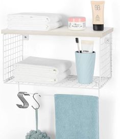 a shelf with towels and other items on it