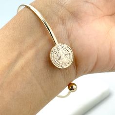 18k Gold Filled Saint Benedict Medal Coin, San Benito Coin Bangle Cuff Bracelet, Adjustable Bracelet, Wholesale Jewelry Making Supplies.Bracelet Size: -Length: 70mm / Width: 69mm Adjustable Coin Bracelet Gold, Gold Nickel-free Bangle Charm Bracelet, Nickel-free Gold Bangle Charm Bracelet, Gold Nickel-free Round Cuff Bracelet, Gold Coin Jewelry, Saint Benedict Medal, Benedict Medal, Accesories Jewelry, Gold Coin Necklace