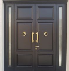 two black double doors with gold handles on each side