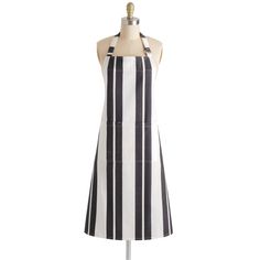 a black and white striped apron on a mannequin