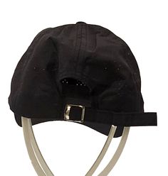 a black hat with a metal buckle on it