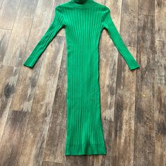 Fitted Sweater Dress Green Stretch Dresses For Winter, Fall Season High Neck Green Dress, Green High Neck Dress For Fall, High Neck Green Dress For Fall, Winter Green Ribbed Midi Dress, Fitted Green Winter Dress, Winter Green Fitted Dress, Green Fitted Dress For Winter, Fitted Green Dress For Winter