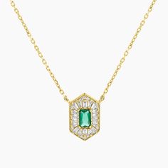 Elevate your style with our Gold-Plated over Sterling silver Art Deco Pendant. Meticulously crafted, this captivating pendant showcases an emerald-cut green spinel at its center, complemented by exquisite baguettes. The unique exagonal shape adds a touch of vintage elegance. With a 16-inch chain and 2-inch extension, this pendant offers a customizable fit. Embrace the vintage-inspired beauty of this Gold-Plated Art Deco Pendant, perfect for adding a touch of sophistication and glamour to any ensemble. Elegant Green Baguette Cut Necklace, Elegant Octagon Green Necklace, Elegant Green Octagon Necklace, Emerald Cut Baguette Diamonds May Birthstone Jewelry, Emerald Cut Baguette Diamond Jewelry For May Birthstone, Elegant Green Baguette Cut Emerald Necklace, Elegant Green Baguette-cut Emerald Necklace, Art Deco Green Octagon Jewelry, Green Baguette Diamond Jewelry For May Birthstone