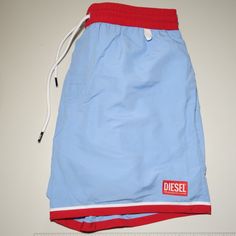 Diesel Bmbx Wave-B Solid Blue And Red Accents Beachwear Swim Shorts With A Quick-Dry Finish, Crafted Using Certified Recycled Polyester. * New With Tags * Usps Tracking Included * Sourced From The Reuse Sector. Size - Large Gift Suggestions - Luxury - Spring & Summer Item Condition Please Understand That Since These Items Are Vintage And/Or Recycled, They May In Fact Show A Little Sign Of Wear, Aging, Or Slight Discoloration. If We List Something As New Old Stock (Nos) Or New, It Will Be In Exce Gift Suggestions, Beach Swimwear, Large Gift, Red Accents, Man Swimming, Swim Trunks, Swim Shorts, Cute Shoes, Quick Dry