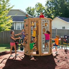 children playing in a wooden climbing tower