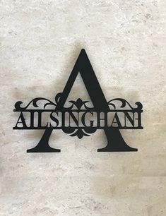 a metal sign that reads,'alsinghann'on the side of a wall