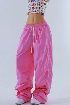 Sporty Straight Cargo Pants For Spring, Pink Stretch Wide Leg Parachute Pants, Pink Stretch Cargo Pants For Spring, Casual Pink Parachute Pants For Spring, Spring Pink Stretch Cargo Pants, Pink Wide Leg Parachute Pants For Streetwear, Baggy Pink Cargo Pants For Summer, Baggy Pink Summer Cargo Pants, Spring Baggy Solid Color Cargo Pants