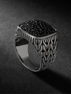 John Hardy's signet ring is designed to look like its signature chain-weaving technique. It's handcrafted from silver and set with scores of black sapphires along the bezel. Luxury Black Spinel Round Ring, Luxury Formal Rings With Stones, Classic Black Spinel Ring With Black Diamonds, Luxury Black Spinel Rings For Formal Occasion, Luxury White Gold Rings With Stones, Formal Black Spinel Ring In Fine Jewelry Style, Formal Fine Jewelry Black Spinel Ring, Black Spinel Rings For Formal Occasions, Black Spinel Ring With Black Diamonds For Formal Occasions