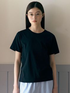 Composition : Cotton 100%Country of Origin : KOREA Black Minimalist Cotton T-shirt, Minimalist Black Cotton T-shirt, Black Cotton Minimalist T-shirt, Black Cotton Minimalist Tops, Black Minimalist Crew Neck T-shirt, Black Minimalist Cotton Top, Minimalist Black Cotton Tops, Black Relaxed Fit Basic T-shirt, Simple Black Cotton T-shirt