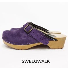 Step into timeless Scandinavian style with these SWED2WALK clogs. Crafted in Sweden with love and care, these classic clogs feature SUEDE leather uppers and a sustainable Lime Wood base from FSC managed forests. The 5cm heel and 2cm platform provide the perfect height for a comfortably shaped footbed. Made from natural leather, these clogs may feel slightly firm at first but will soften over time for ultimate comfort. Swedish Clogs, Leather Clog, Clog Boots, Suede Handbags, Purple Suede, Boots Womens, Leather Clogs, Natural Gifts, Suede Sandals